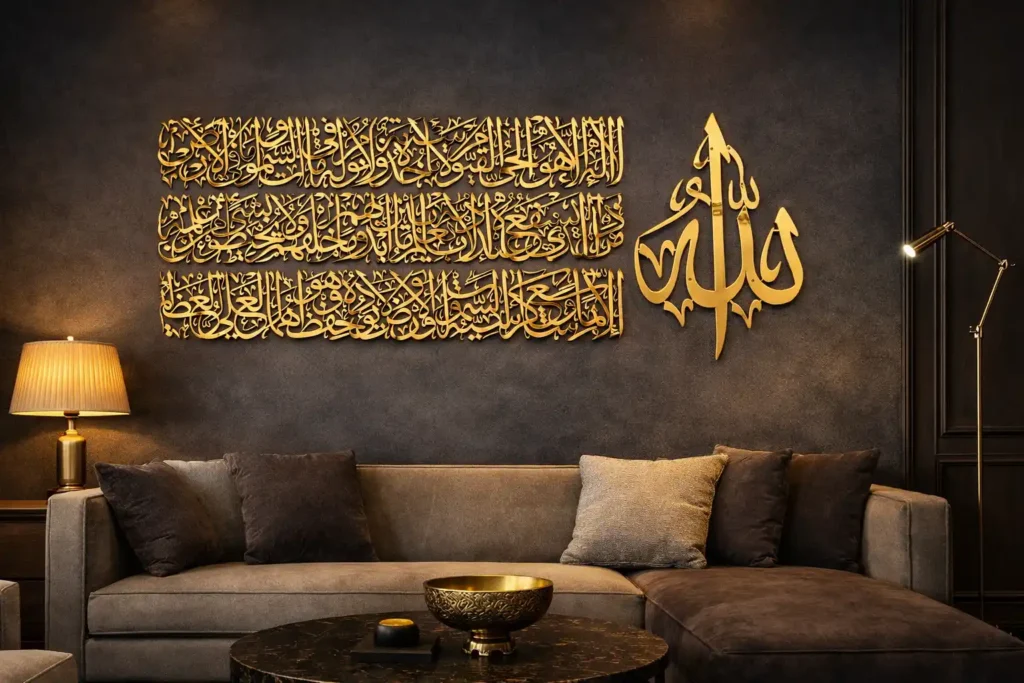 Large panoramic ayat al kursi metal wall art in shiny gold by iwa concept on a dark modern wall.
