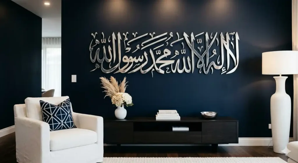 Large silver metal Islamic calligraphy wall art on a dark navy blue wall in a modern living room.